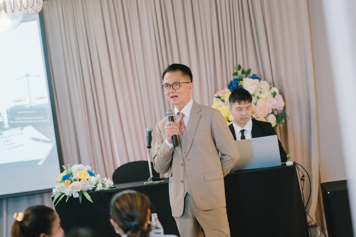 The firm’s senior lawyer addressing the room